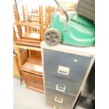 A mahogany chest of three drawers, nest of tables, oak table, filing cabinet and electric lawn mower