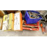 A large quantity of various tools, to include a universal shaper table, tile cutter, etc.