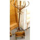 A bentwood coat stand, and a magazine rack. (AF)