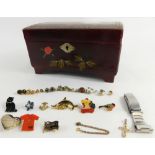 An Oriental lacquer finish jewellery box, a quantity of various costume jewellery, pin badges, etc.