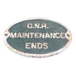 A C.N.R Maintenance Ends cast iron sign, painted on a white and green ground, oval, 32cm x 29cm.