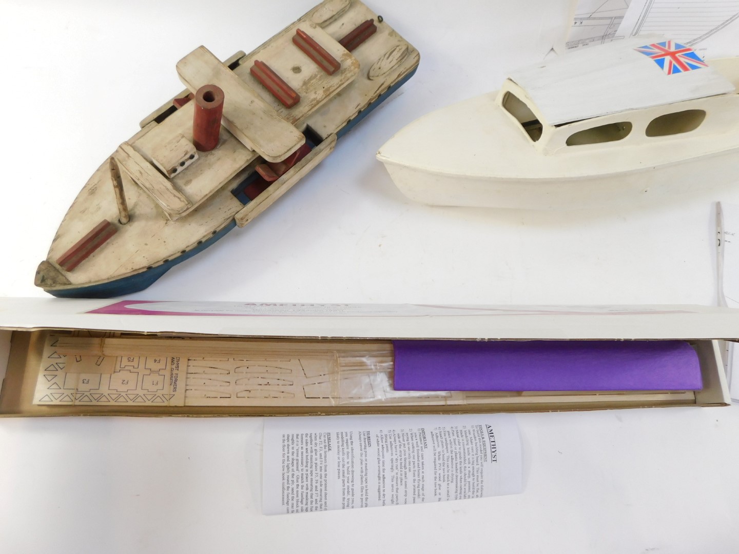 Two painted wooden boats, comprising blue, cream and red painted tug boat, 54cm long, and a white pa - Image 4 of 4