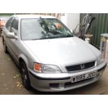 A Honda Civic, registration W595 JDO, petrol, silver, first registered 16th August 2000, MOT expired