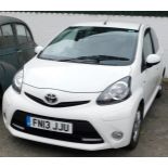 A Toyota Aygo, registration FN13 JJU, petrol, white, first registered 30th March 2013, MOT expired 2