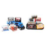 Diecast vehicles, comprising a Big Movers transport, pottery fire engine, Harley Davidson motorcycle