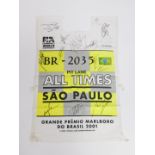 A Formula 1 World Championship Sao Paulo pit lane tabbard for 2001, bearing indistinct signatures, p