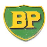 A BP cast iron sign, painted in green and yellow, 22cm x 22cm.