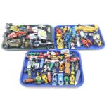 A group of play worn diecast F1 cars, large and medium sized, Lotus, Honda, Ferrari, John Players an