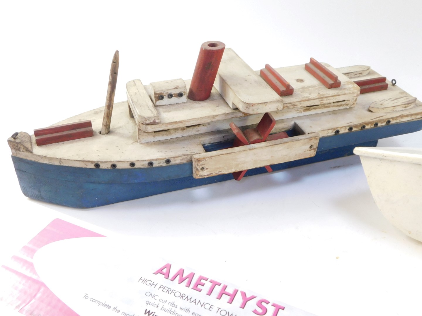 Two painted wooden boats, comprising blue, cream and red painted tug boat, 54cm long, and a white pa - Image 2 of 4