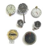 A group of automobile dials, French marked, oil gauges, a British Jaegar eight day gauge, and a 3040