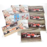 A group of Marlboro F1 racing car posters.