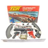 A TCR Total Control Racing JMA car speedway set, boxed.