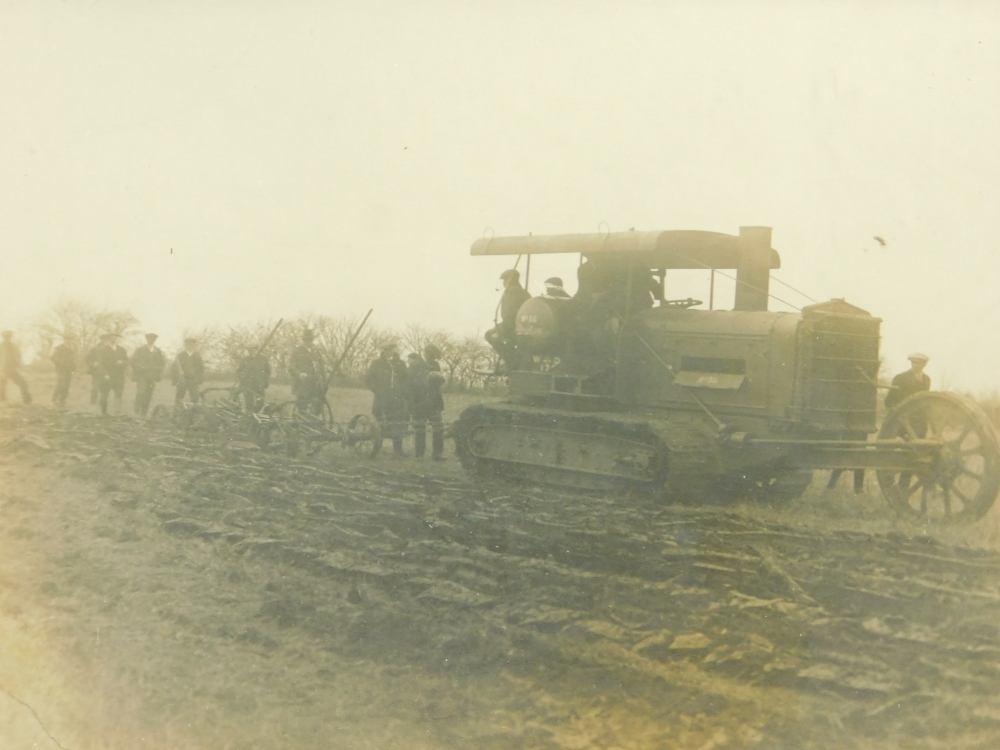 An early 20thC photograph, of a Lincolnshire field with a Caterpillar tractor, possibly Rustons, and - Bild 2 aus 3