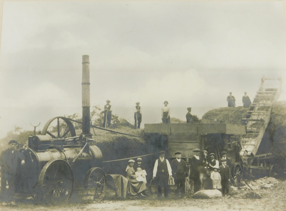 An early 20thC photograph, of a Lincolnshire field with a Caterpillar tractor, possibly Rustons, and