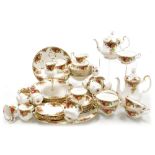 A Royal Albert part tea, coffee and dinner service, decorated in the Old Country Roses pattern, to i