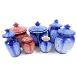 A group of Sylvac lidded jars, decorated in the Canton pattern, blue and cranberry glazed examples.