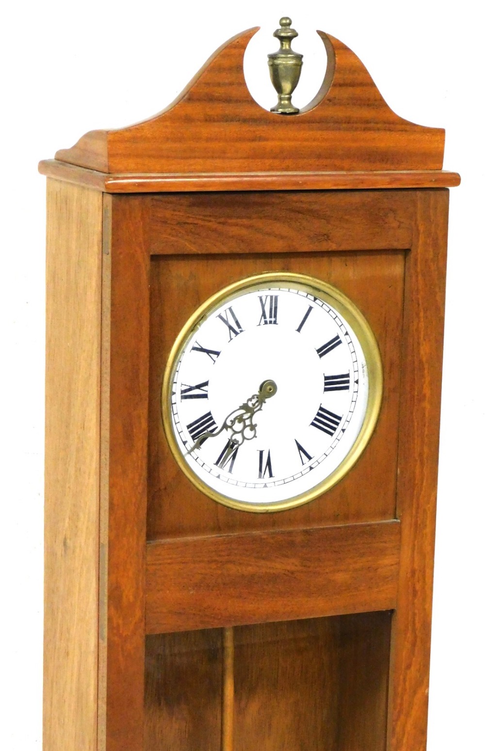 An electric wall clock, the dial with painted Roman numerals, in a teak case, the glazed door enclos