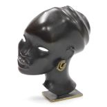Karl Hagenauer (1898-1956). A bronze bust of an African lady, with gold coloured double hoop earring