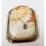 An early 20thC American shell cameo brooch, bust portrait of a lady, wearing a real diamond set neck