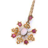 A Victorian opal, ruby and seed pearl pendant, of floral form, with a 9ct gold neck chain, on a bolt