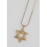 A Star of David pendant, yellow metal with a pierced design, with a 9ct gold cable link neck chain,