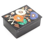 An Indian pietra dura type box and cover, of rectangular form, the top florally inlaid with semi pre