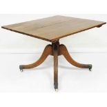 A late Georgian mahogany tilt top breakfast table, the rectangular top raised on a turned column and