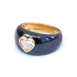 A Bulgari 18ct gold diamond and black enamel ring, set with a heart shaped diamond, size K/L, 9.4g,