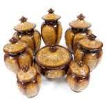 A group of Sylvac pottery jars and covers, decorated in the Canton pattern, amber and brown coloured