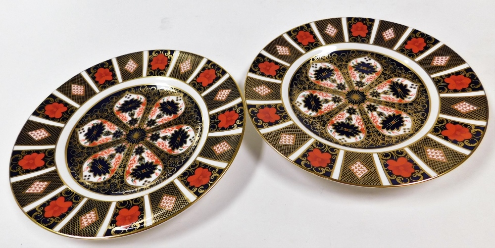 A pair of Royal Crown Derby Old Imari cabinet plates, 1128, seconds, 27cm diameter.