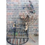 A wrought metal weather vane, with a horse and jockey finial, 144cm high, a wrought metal wall mount