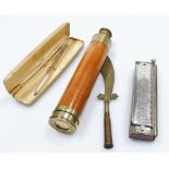 A group of collectables, comprising a Squire ball point pen in gold coloured casing, a brass and tre