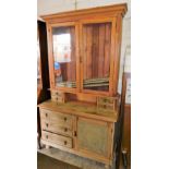 A Lincolnshire type dresser, the associated top with two glazed doors and two small drawers, the bas