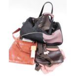 A group of Radley bags, to include a Radley nylon and brown leather across the body bag, with pink t