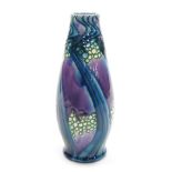 A Minton pottery Secessionist vase, of elongated baluster form, tube line decorated with circles and