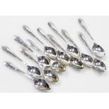 A set of twelve silver coffee spoons, with line and raised clover decoration to each handle, Sheffie