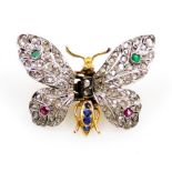 A Victorian diamond, sapphire, ruby and emerald butterfly clip, set in white and gilt metal, 3cm wid