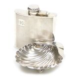 An Edwardian VII silver butter dish, of scallop shell form, raised on three ball feet, Chester 1906,