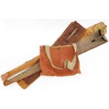 A Brady canvas and leather game bag, and three vintage canvas and leather gun slips. (4)