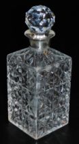 An Elizabeth II cut glass and silver mounted decanter, Sterling Silverware Ltd, Sheffield 1972, 26cm