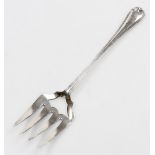 A Victorian silver Old English pattern serving fork, with four prongs and vacant shield shaped secti