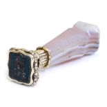 A Victorian bloodstone seal, crest and monogram engraved, set in yellow metal with an agate handle,