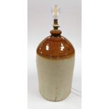 A stoneware flagon, stamped G.W.S Varnish Works Derby, converted to a table lamp, 68cm high.