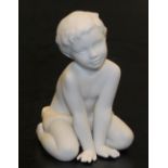 A Lladro matte porcelain The Son figure, printed and impressed marks, 12cm high.