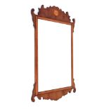 A yew fret frame wall mirror in 18thC style, the shaped crest inlaid with a marquetry fan, 100cm x 5
