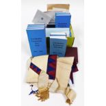 A group of Masonic regalia, to include apron, gloves, sash, various Lincolnshire Freemasons yearbook