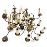 A pair of brass eight arm chandeliers, 44cm wide, and two further three branch brass chandeliers. (4