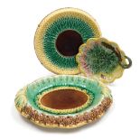 Three items of Majolica, comprising an oval 'Bread' basket with raised sides and wheat sheaf decorat