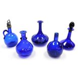 A group of five Bristol Blue decanters, to include a decanter and stopper, a decanter engraved with
