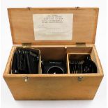 A Leitz Aristophot Macro-DIA apparatus, in fitted box, various photographic lights, etc.